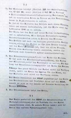 Die Hauptausfertigung des Mietvertrages zwischen der Kreisverwaltung St. Goarshausen und dem Reichsschatzmeister der NSDAP vom 8. Dezember 1937. Das Dokument trägt die Siegel und Unterschriften des Landrates, der Gauleitung und des in München residierenden Reichsschatzmeisters der NSDAP, Franz Xaver Schwarz. Die Tatsache, dass der Mietvertrag der Genehmigung durch die oberste Parteiführung bedurfte, wirft ein Schlaglicht auf das die NSDAP kennzeichnende Führerprinzip.